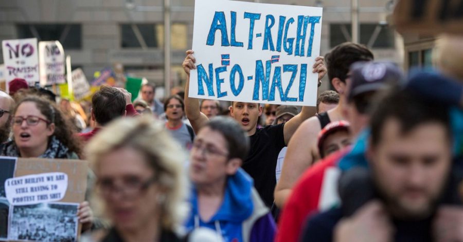 Protesters marching in Washington, outside an Alt-Right conference. Courtesy of The New York Times