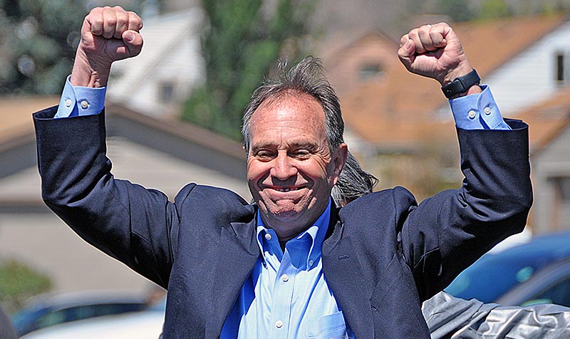 U.S. Rep. Ed Perlmutter, an Arvada Democrat, raises his hands in the air before announcing hes running for governor of Colorado in the 2018 election on Sunday, April 9, 2017, at the Natural Grocers store in Golden. Courtesy of Ernest Luning/The Colorado Statesman