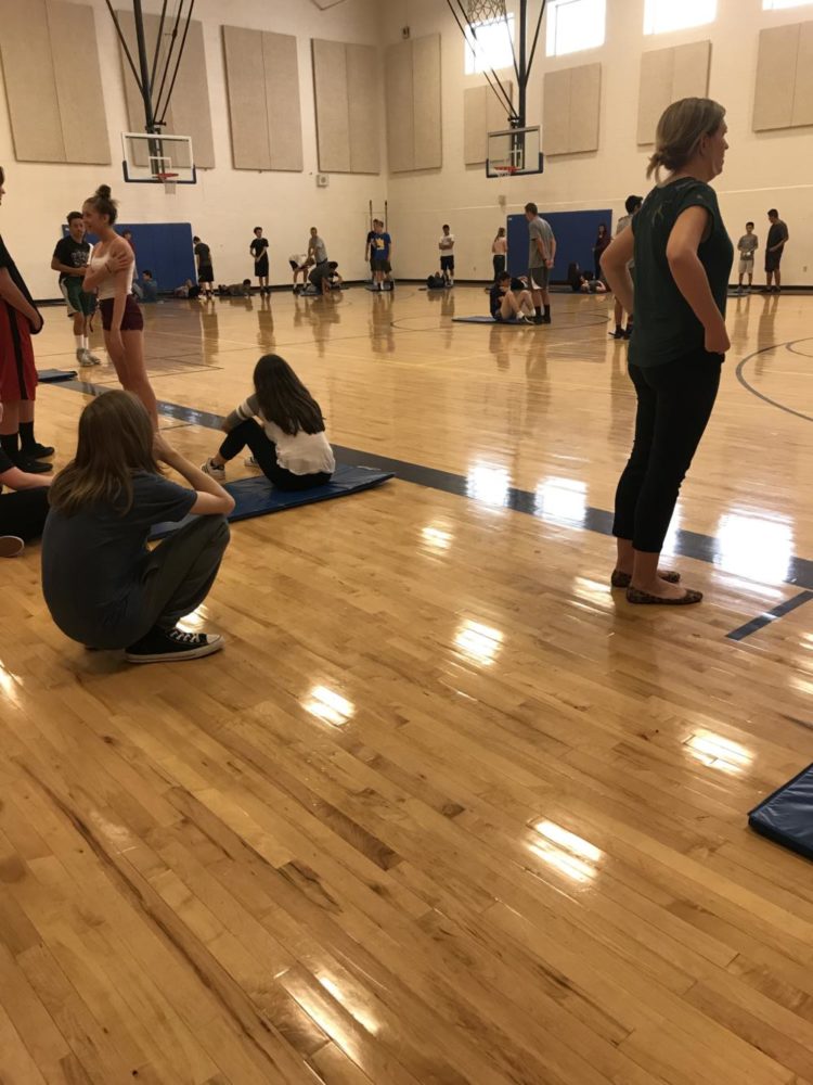 WRHS students doing the sit-ups test in gym class.