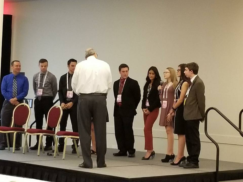 Students from Wheat Ridge High School's STEM department presenting at the AAPEX conference in Las Vegas.