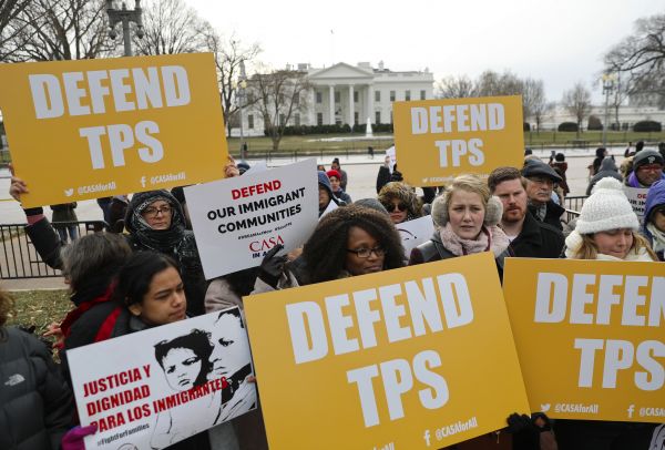 El Salvadorans protesting the removal of TPS.