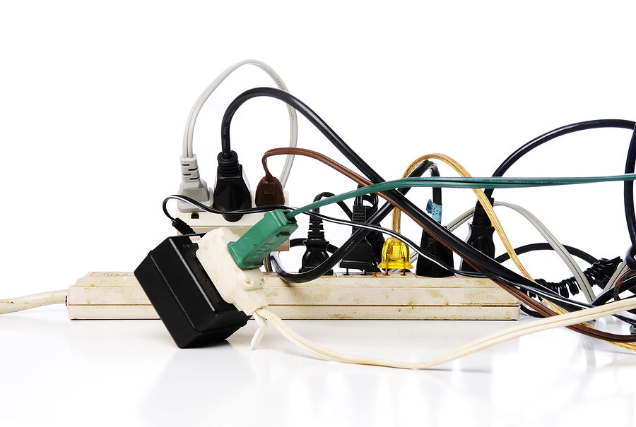 Power strip and extension cord jumble