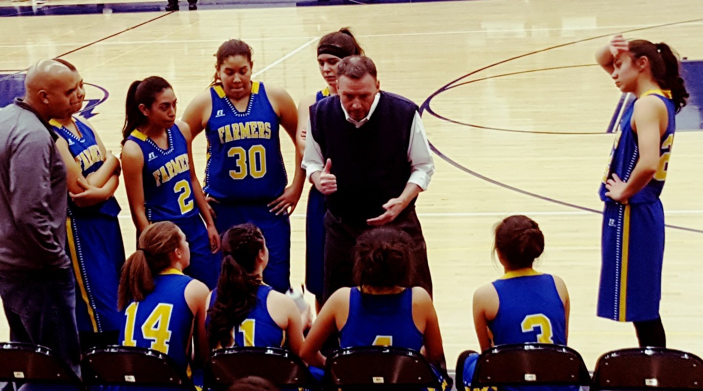 Coach Kevin Porter talking to his players after an encouraging third quarter against Valor.