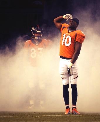 Emmanuel Sanders coming out of the tunnel doing the "Mile High Salute" 