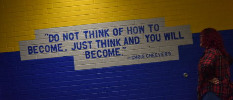 Leyla Gomez Staring at the Chris Cheevers quote featured in the Wheat Ridge High School annex.  