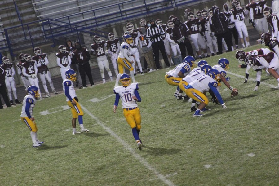 Wheat Ridge Farmers offensive line, getting ready to snap the ball against Golden