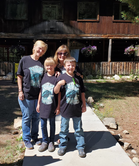 Lee and her wife and grandchildren pictured here