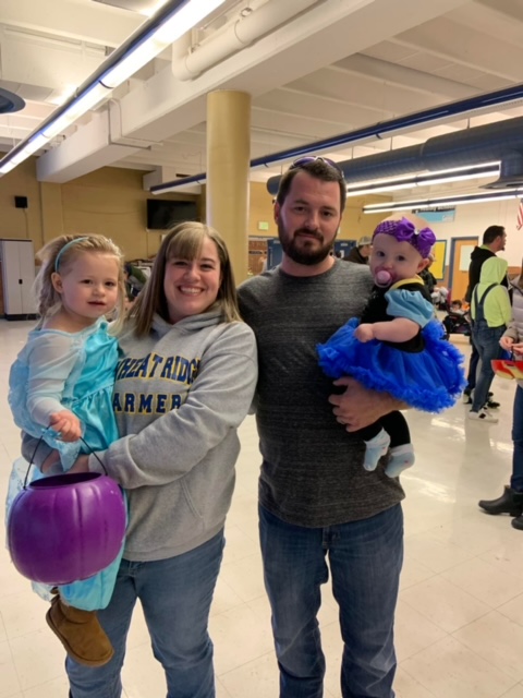 Sabrina Harrison attends Trick-or-Treat Street in October of 2019 with her daughters Ashlynn and Madalynn and her husband, Matt.